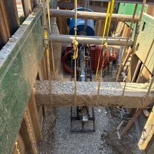 Drill Rig is lowered into trench