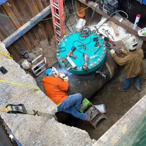 Hot tap drilling commences and 54" line is tapped