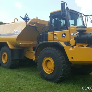 Second articulated water tanker truck with the fill nozzle on top of the tank