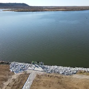 Aerial of the completed overlook platform and stone-protected shoreline